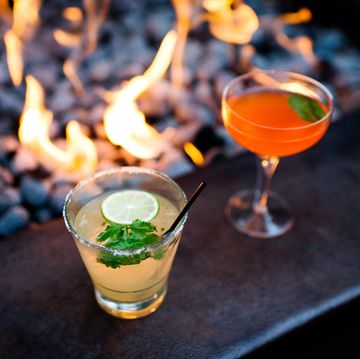 Two cocktails by restaurant open fire two cocktails by restaurant open fire